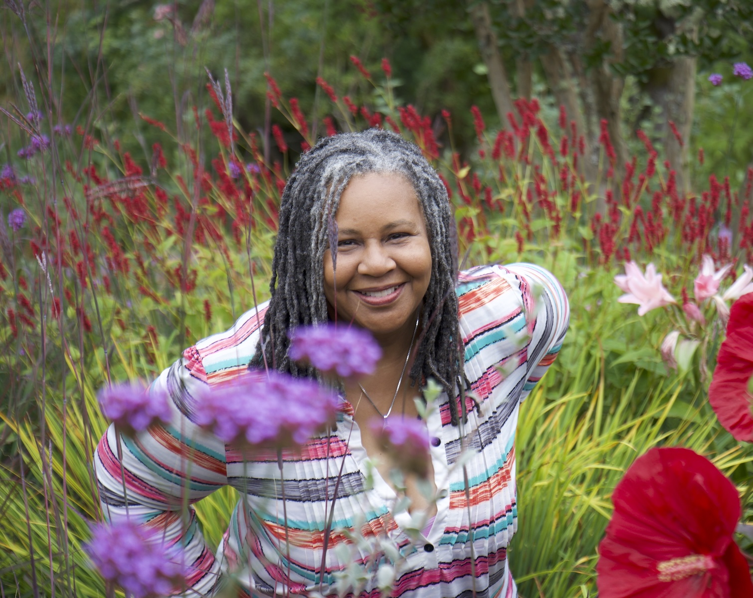 Dara Pressley, herbalist and formulator behind Sassy Roots, in a Pacific Northwest garden