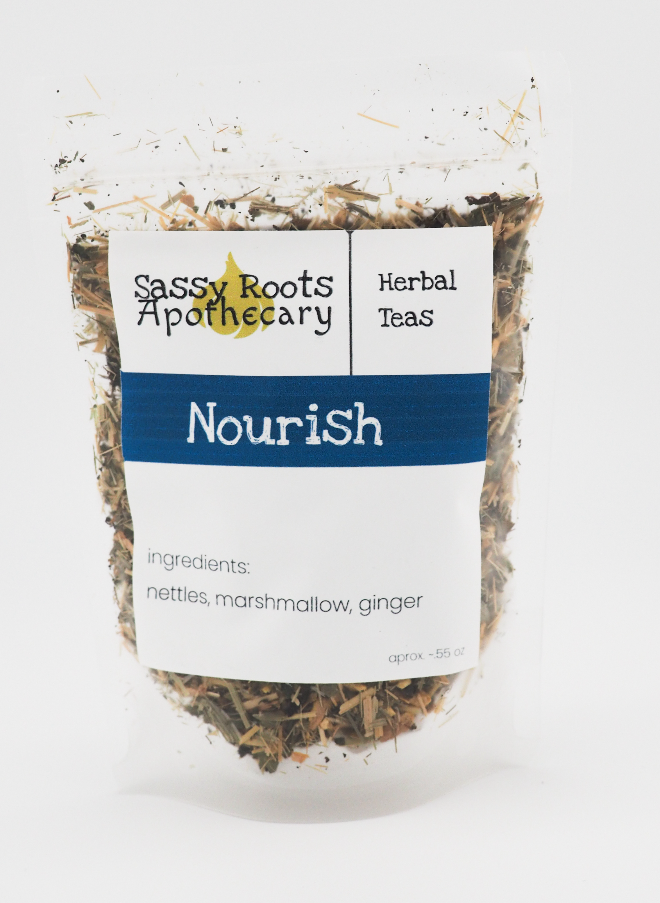 photo of a cup of nourish tea with product packaging in the background.